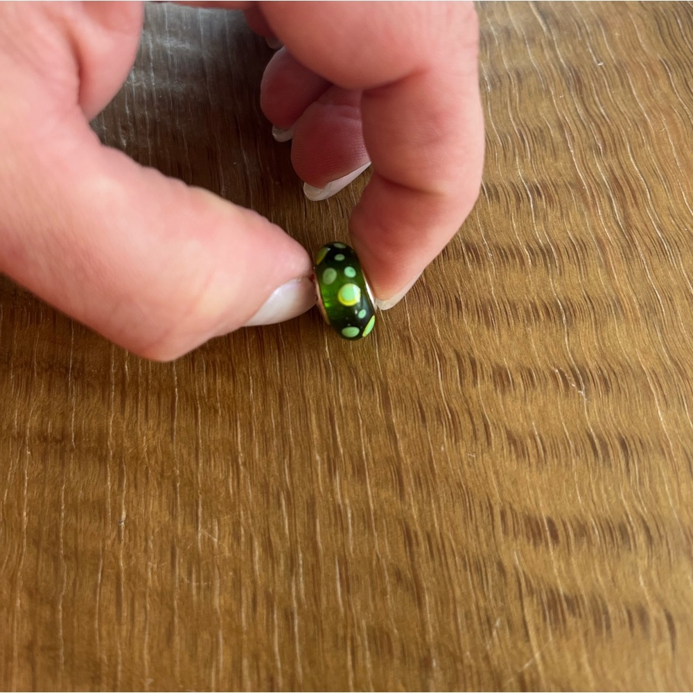 Green glass charm